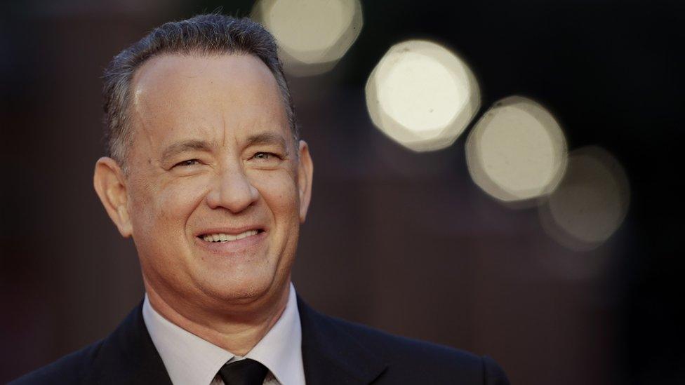 Tom Hanks, smiling