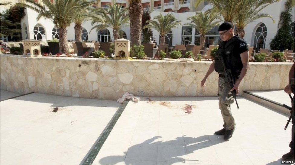 Police officer outside hotel in Sousse, Tunisia, following attack on 26 June 2015