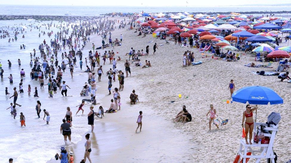 Bathers at the beach in Ocean City, Maryland, 22 July 2017