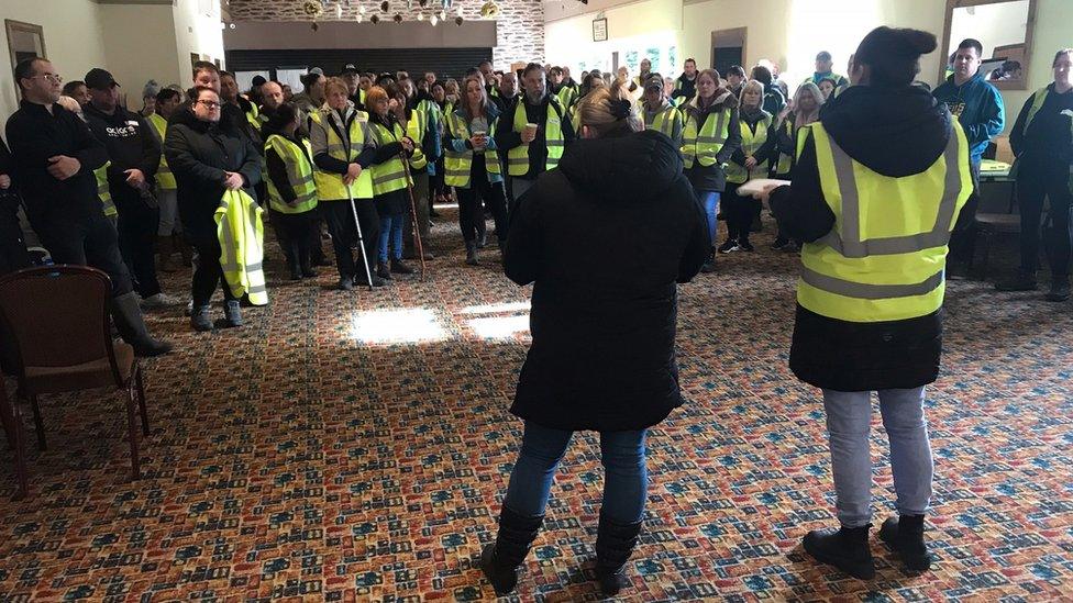 Volunteers gather ahead of the search