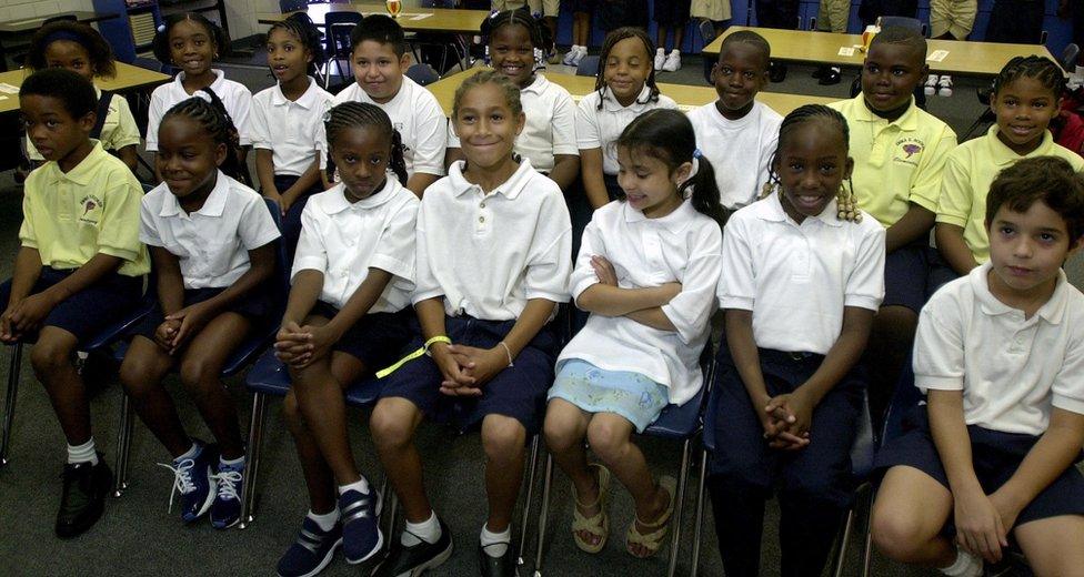 The group reunited in 2002 - Natalia is third from left in the front row