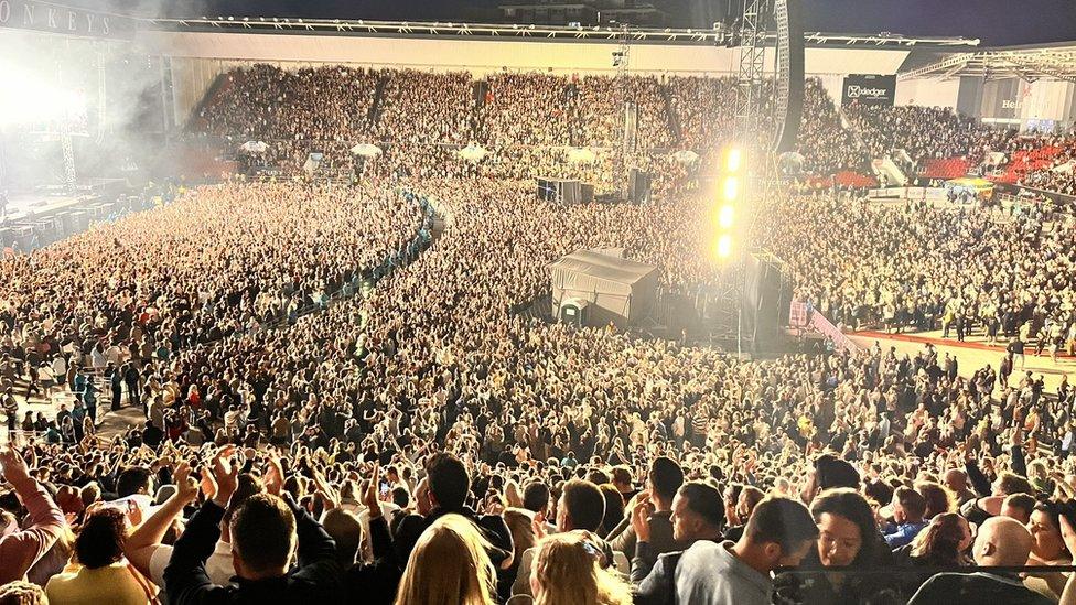 A wide picture of a packed Ashton Gate Stadium during the Arctic Monkeys concert