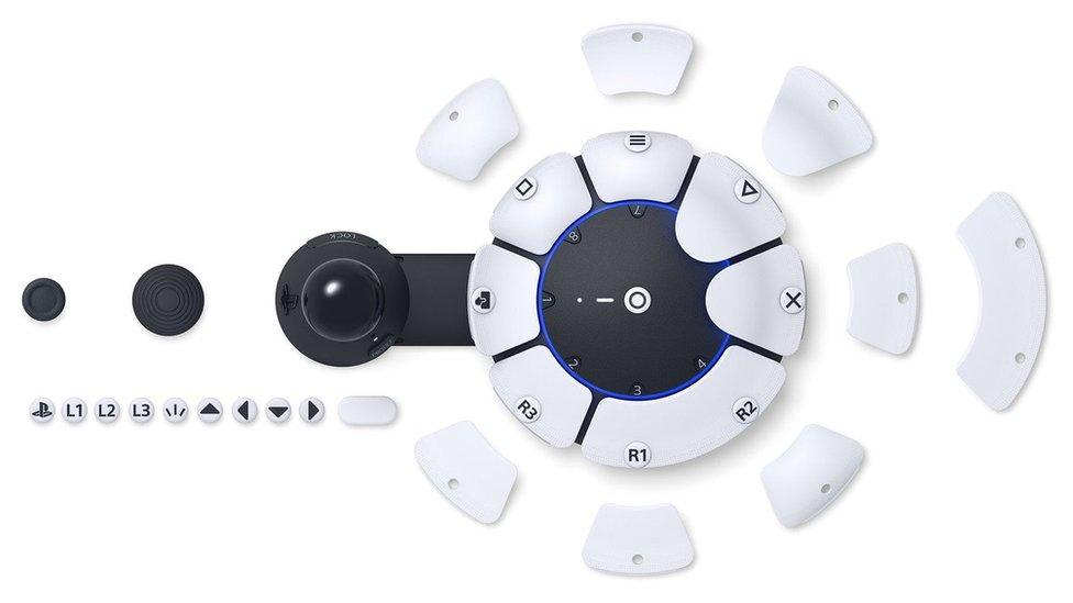 A selection of the components for the controller, showing all of the different PlayStation inputs