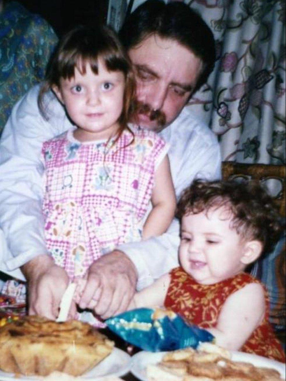 Idris Khattak and his daughters when they were younger