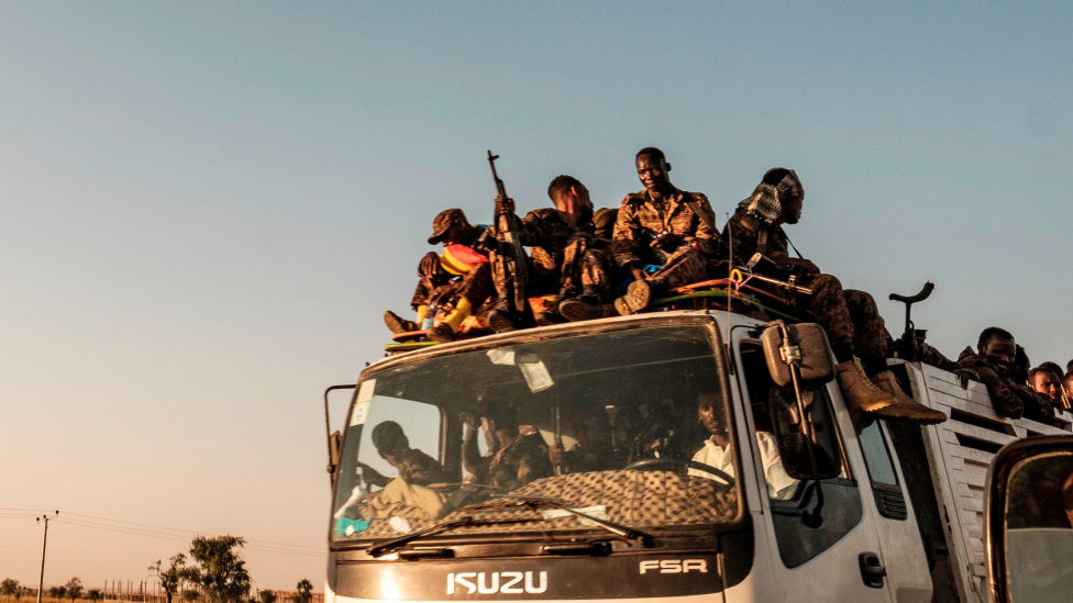 Ethiopian soldiers on the back of a lorry on a road near the city of Humera, Ethiopia - 21 November 2020