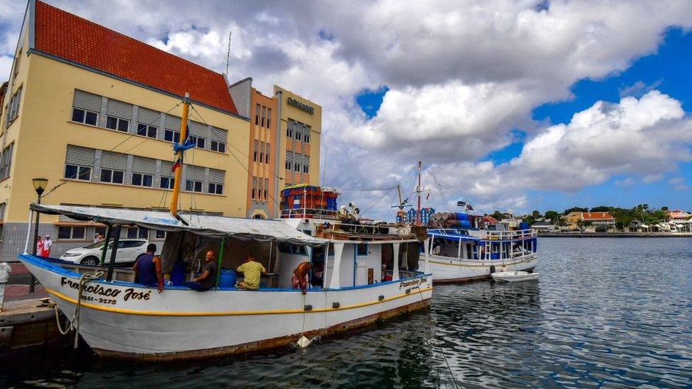 Venezuelan boats remains moored at a port in Willemstad, Curaçao