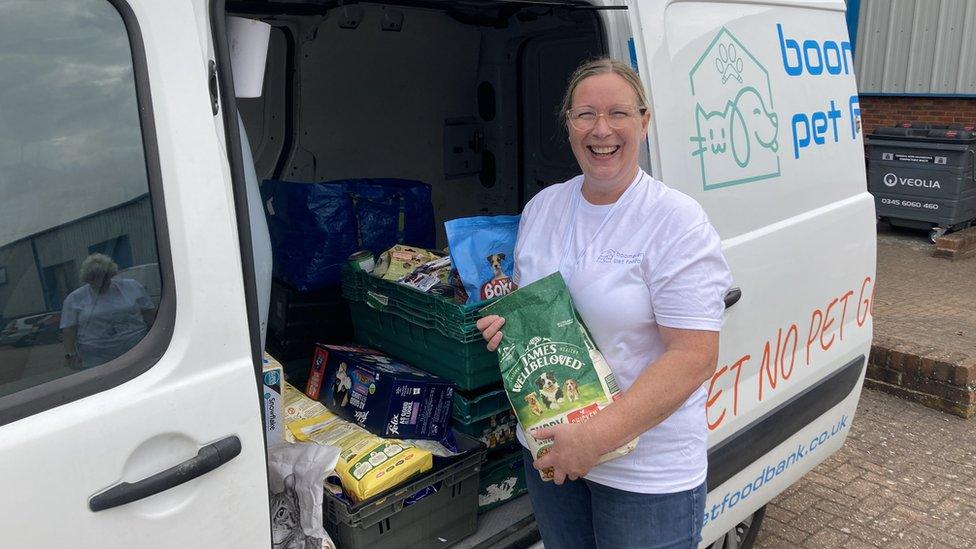 Tanya Rudkin loading the pet foodbank van