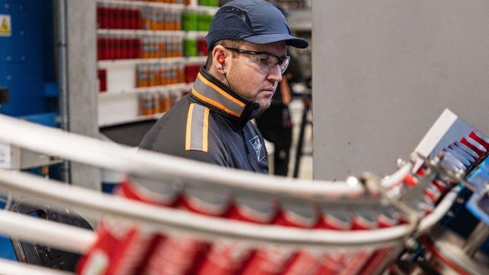 Man working in a soft drinks production facility