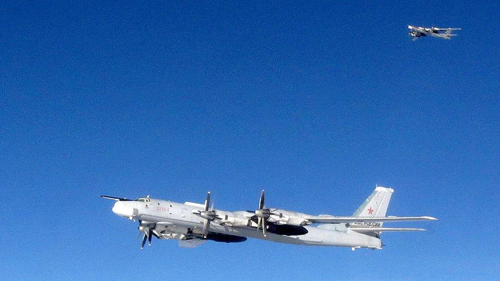 A pair of Russian Bear aircraft pictured from a Royal Air Force Quick Reaction Alert (QRA) Typhoon during an intercept in September 2014