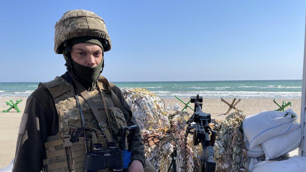 A Ukrainian soldier mans an anti-aircraft gun in the historic city of Odesa.