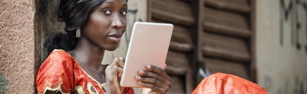 woman using tablet