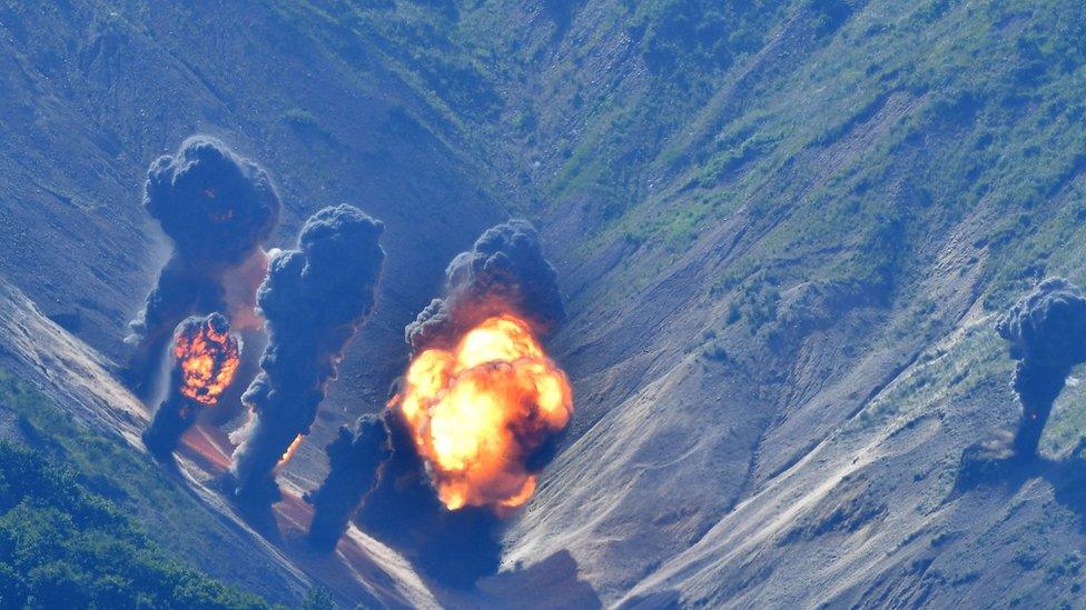 In this handout image provide by South Korean Defence Ministry, bombs hit mock targets at the Pilseung Firing Range on 31 August 2017 in Gangwon-do, South Korea