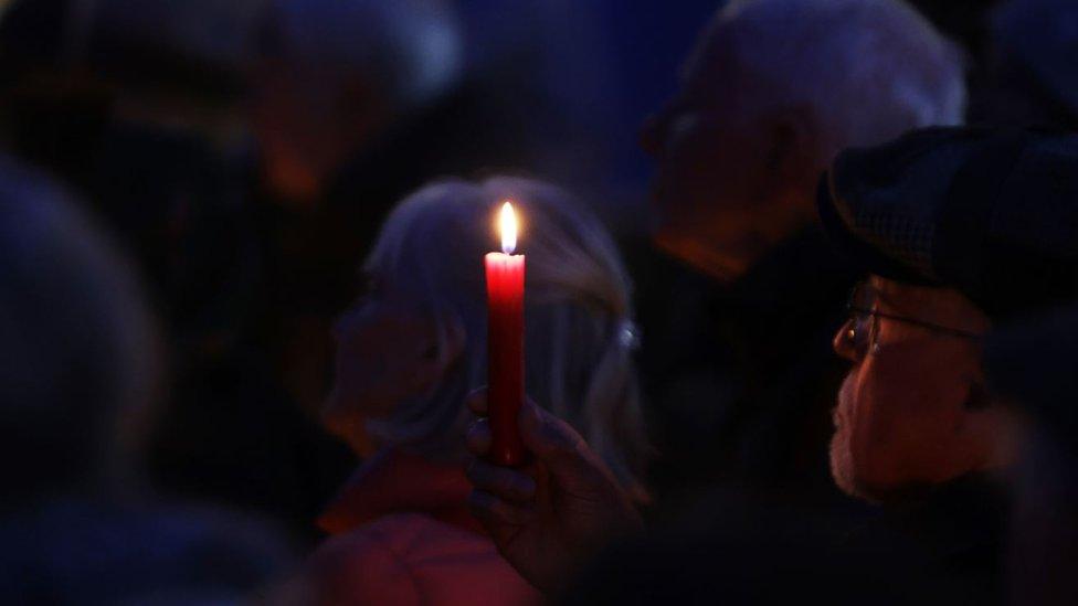 Resident with a candle