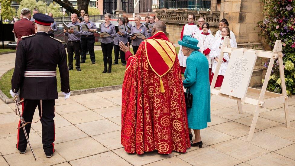 The Queen watching performance by Manchester Lesbian and Gay Chorus