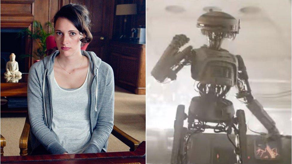 Phoebe Waller-Bridge and a droid from Solo: A Star Wars Story