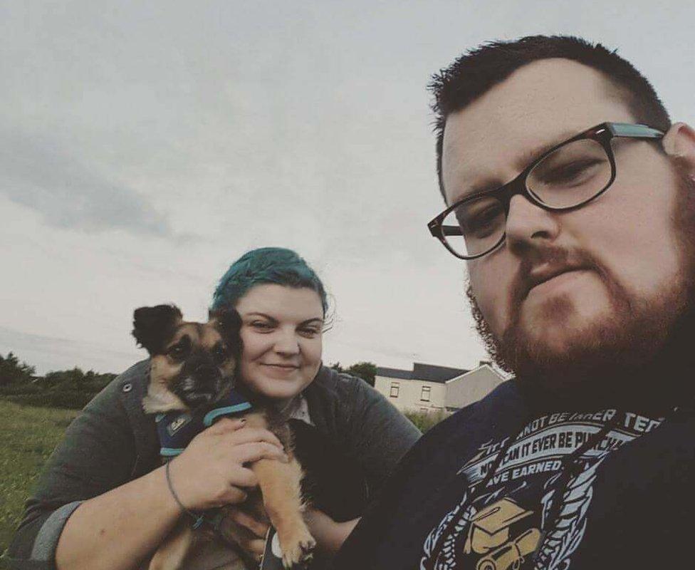 Rhian with her husband Kerry and dog Cookie