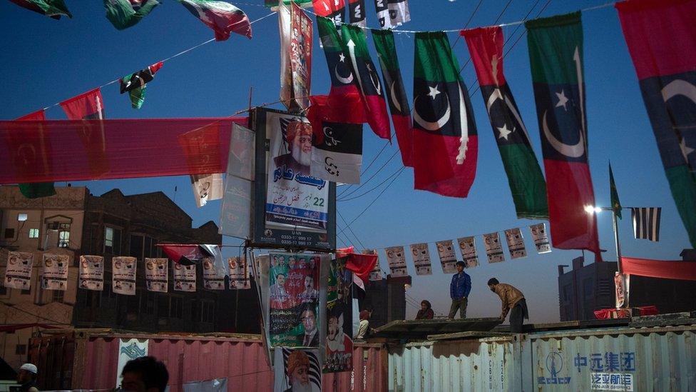 Workers decorate the venue for Pakistan Democratic Movement protest