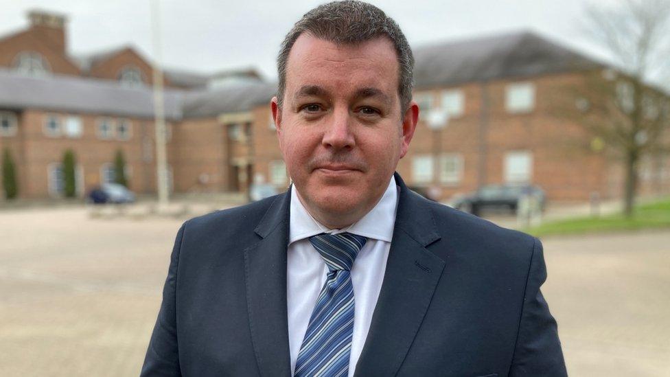 Det Insp David McCormack wearing a suit outside Norwich Crown Court