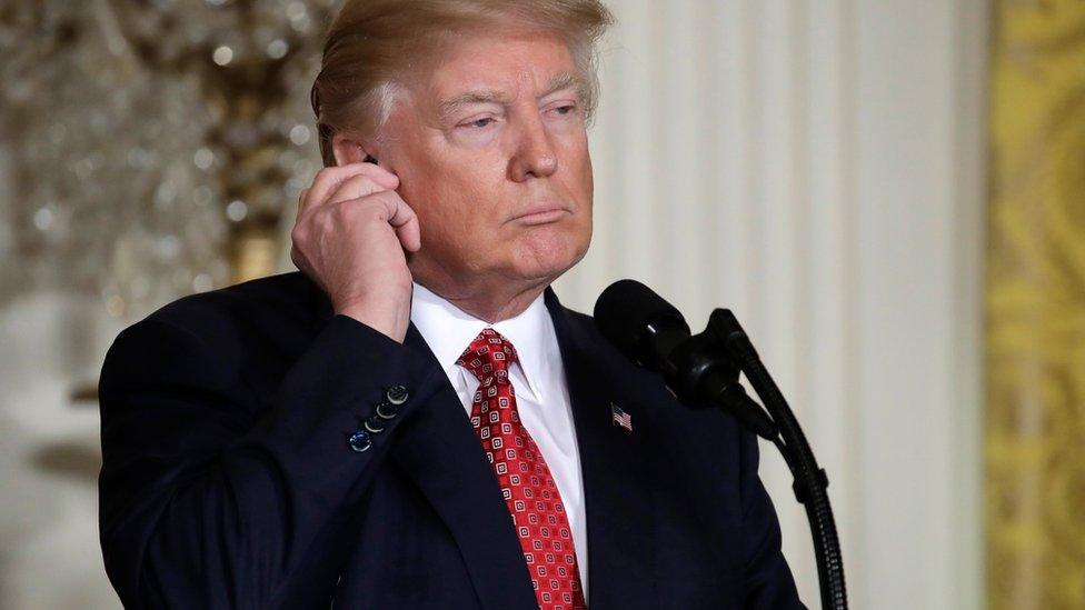 President Donald Trump listens during a joint news conference with Japanese Prime Minister Shinzo Abe, on 10 February