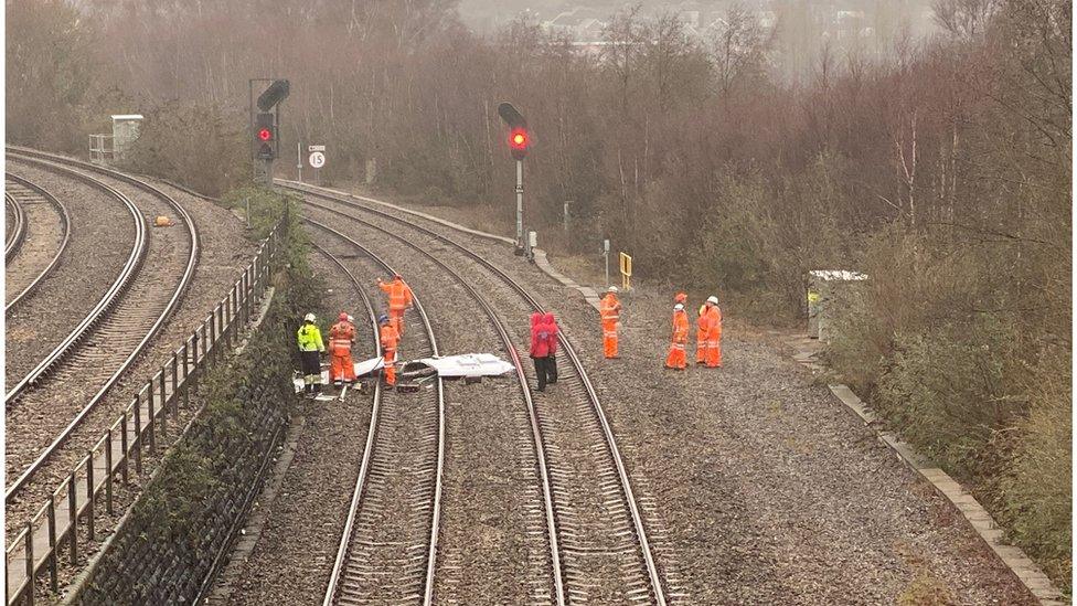 The roof of the bus on railway tracks