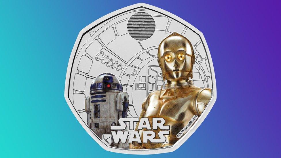 R2-D2 and C3PO on a coin