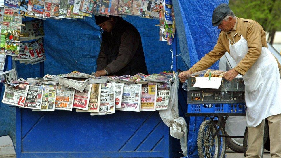 Newspaper seller in Bucharest