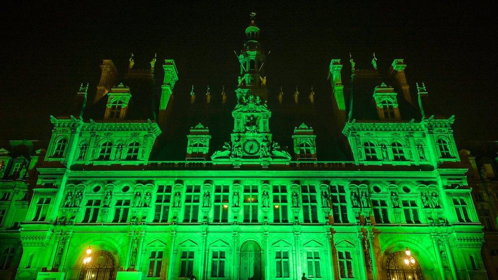 Paris City Hall glowing bright green