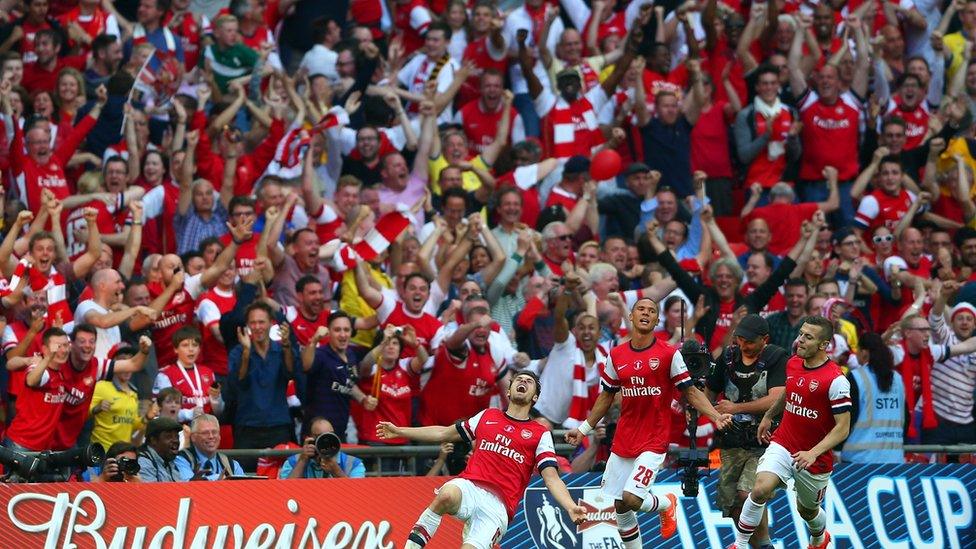 Ramsey scores the winning goal in the 2014 FA Cup final against Hull City.