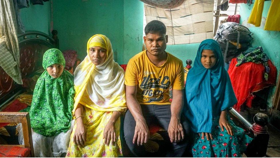 Fatema Begum with her husband and two children Monira, 9, Shormila, 7,