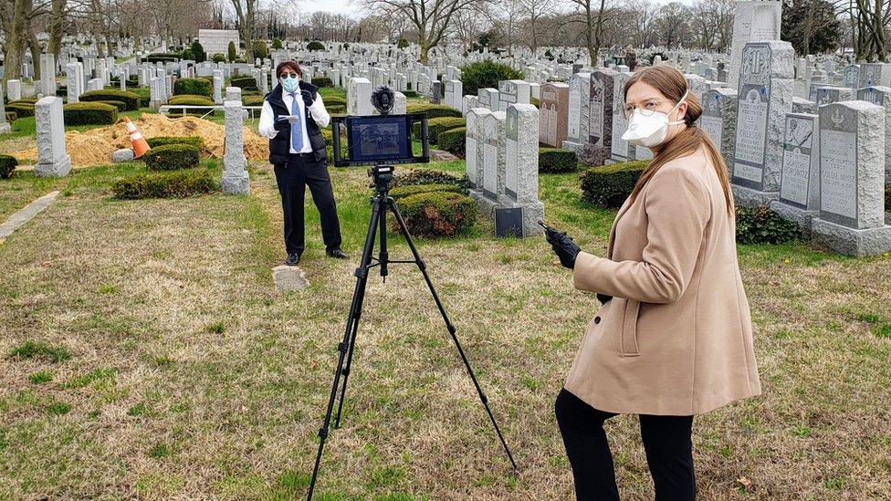 Tribucast staff preparing to live stream a burial