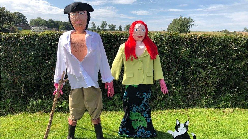 Poldark and Demelza scarecrows