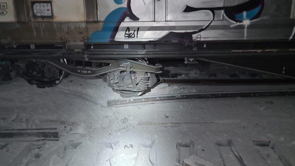 Derailed wagons inside Swiss rail tunnel