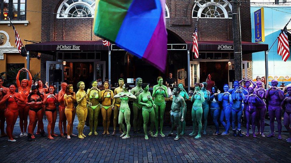 People painted in rainbow colours in solidarity with victims of Pulse nightclub shootings, Orlando, 17 June 2016