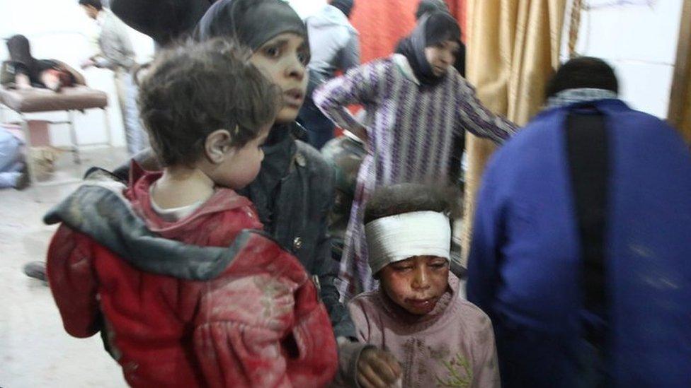 Wounded Syrians seek treatment at a makeshift hospital in Kafr Batna, in the besieged rebel-held Eastern Ghouta, following reported Syrian government air strikes (21 February 2018)