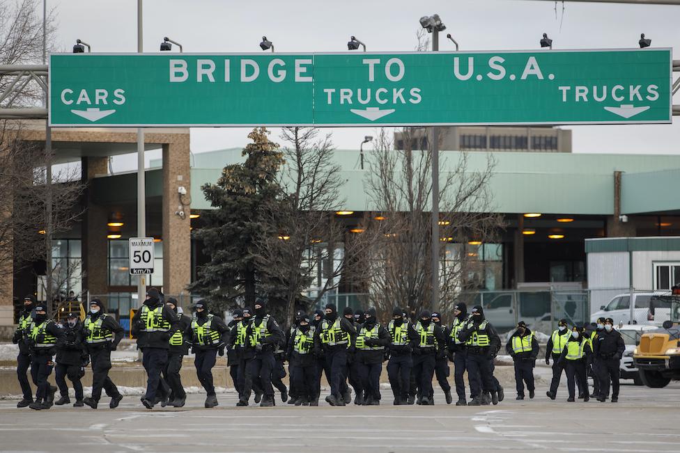 Police line the bridge