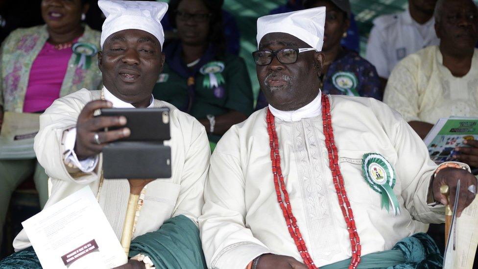 Nigerian chiefs pose for a selfie during the independence day celebration in Lagos, Nigeria -Saturday 1 October 2016