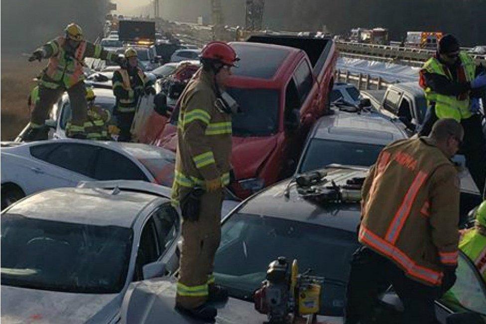 Damaged vehicles are seen after a crash on I-64 in York County, Virginia, December 22, 2019