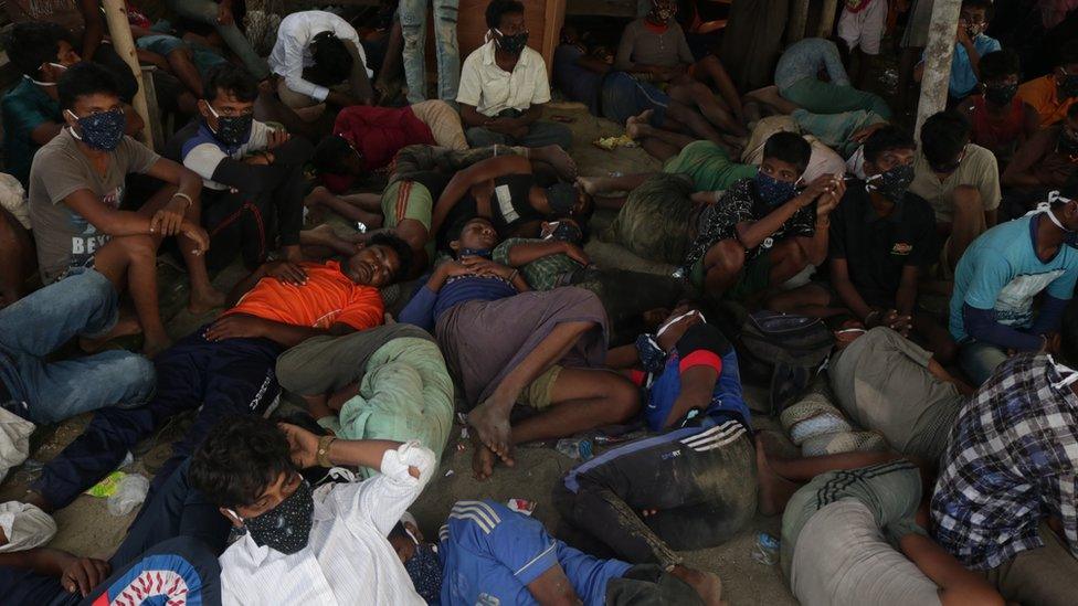 Rohingya refugees take rest after disembarking from a boat at Rancong Beach, Lhok Seumawe, North Aceh, Indonesia, 07 September 2020