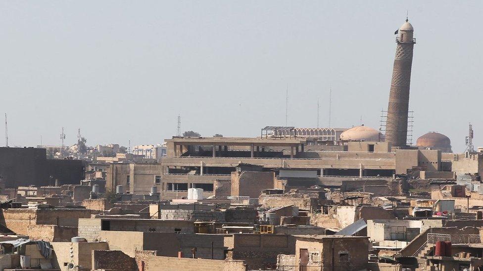 A general view of Mosul taken on 25 March 2017, showing the leaning minaret of the Great Mosque of al-Nuri in Mosul