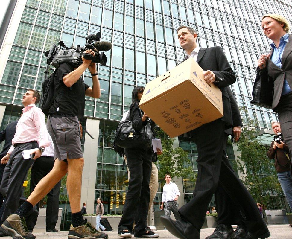 Lehman Brothers staff leaving the London HQ after the firm filed for bankruptcy