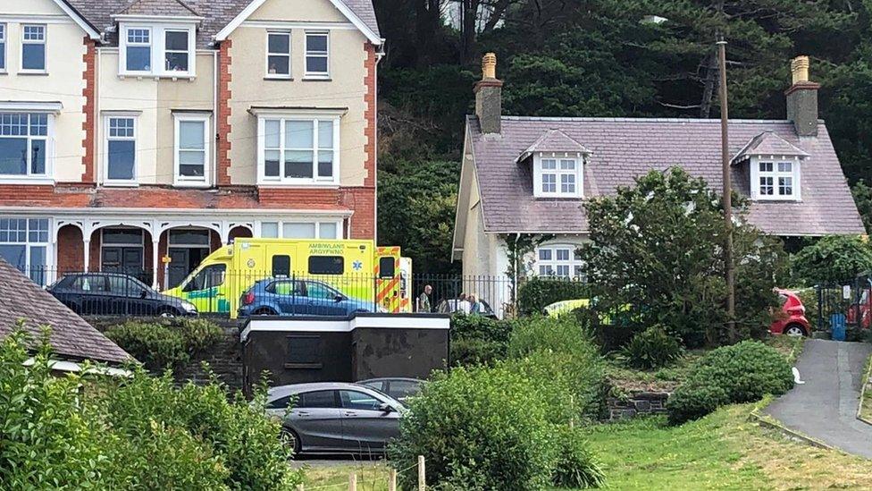 An ambulance and rapid response car at the scene