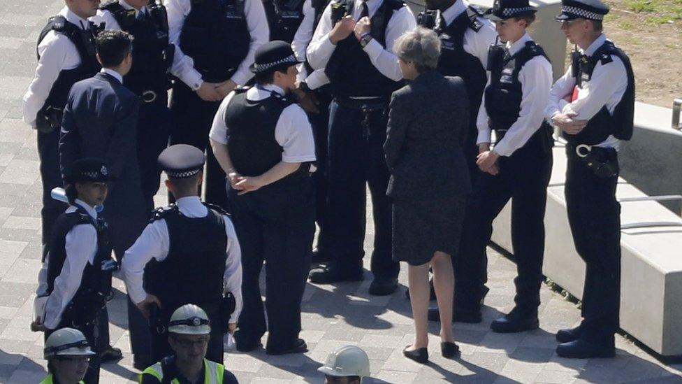 Theresa May visits Grenfell Tower