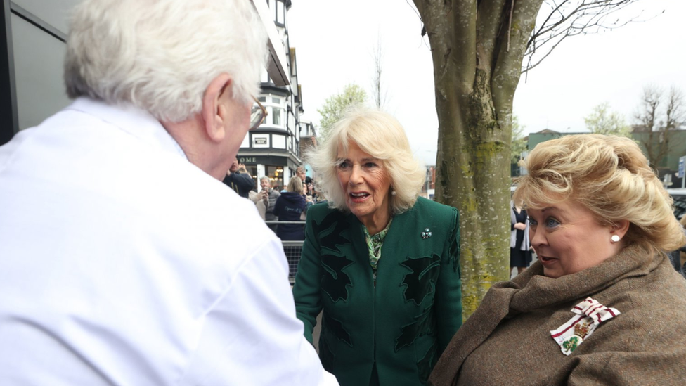 The Queen was accompanied by the Lord Lieutenant of Belfast Dame Fionnuala Jay-O'Boyle as she greeted shop keepers on the Lisburn Road