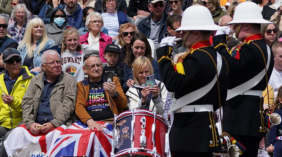 Crowds watch as the Band of Her Majesty's Royal Marines Scotland plays in Princess Street Gardens in Edinburgh during a Platinum Jubilee event on day four of the Platinum Jubilee celebrations.