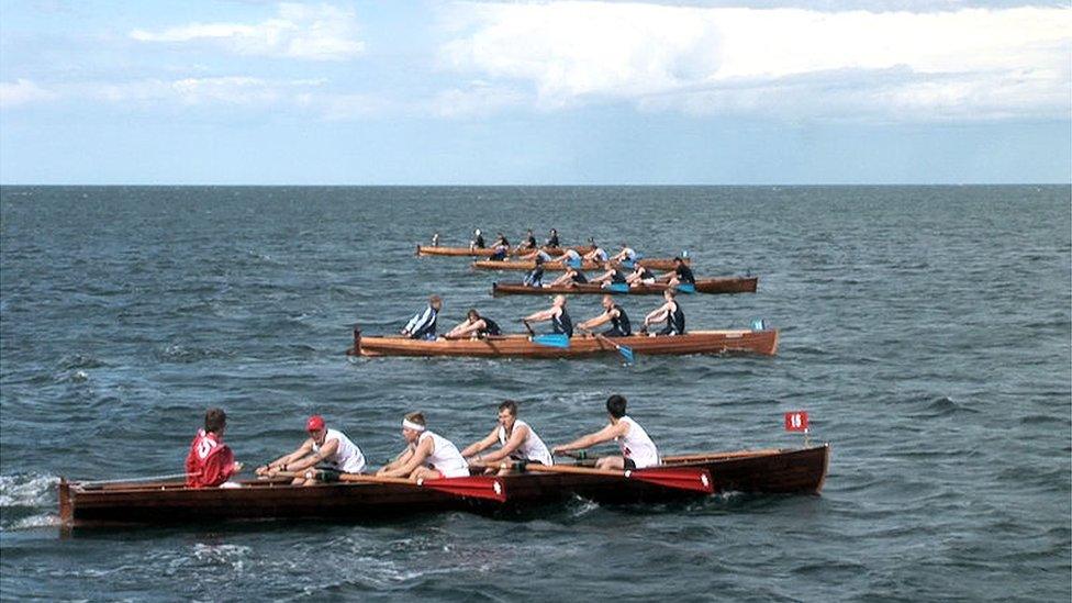 Rowing across Whitby Harbour