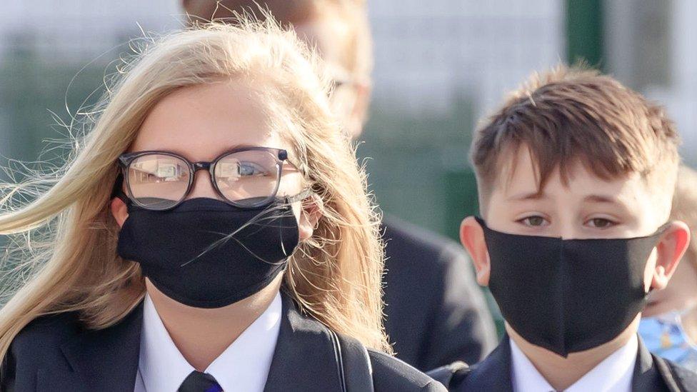 school children wearing masks