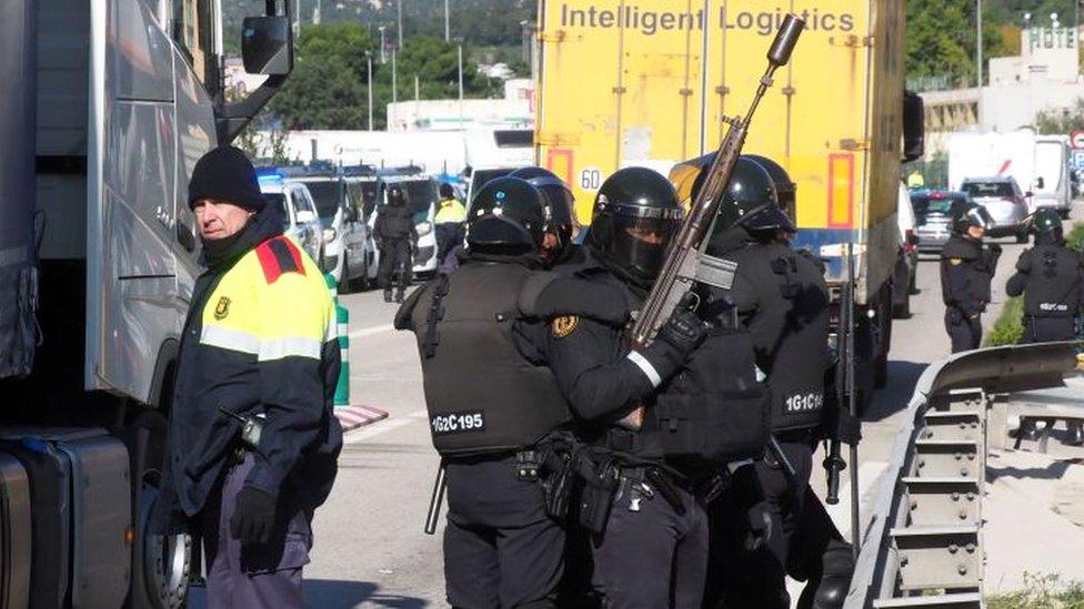 Spanish policemen patrol at the Spanish-French border in La Jonquera northern Spain, on November 12, 2019