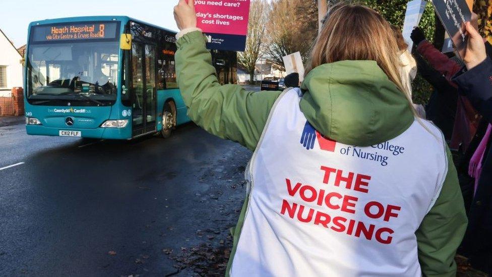 A nurse at a picket line in Cardiff