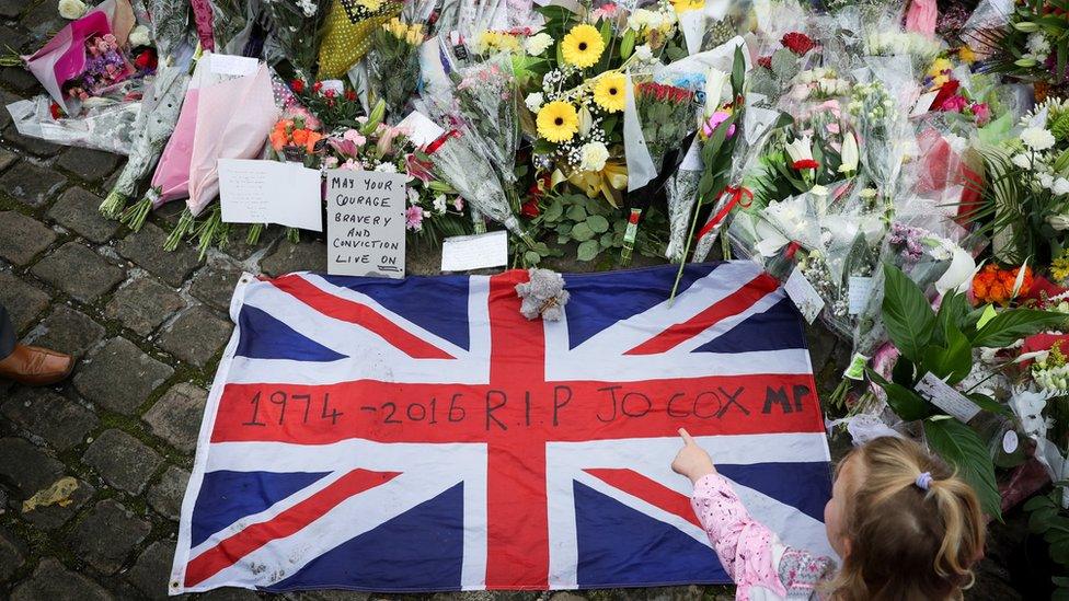 Flowers are left close to where the MP Jo Cox was killed on 17 June 2016 in Birstall, United Kingdom.