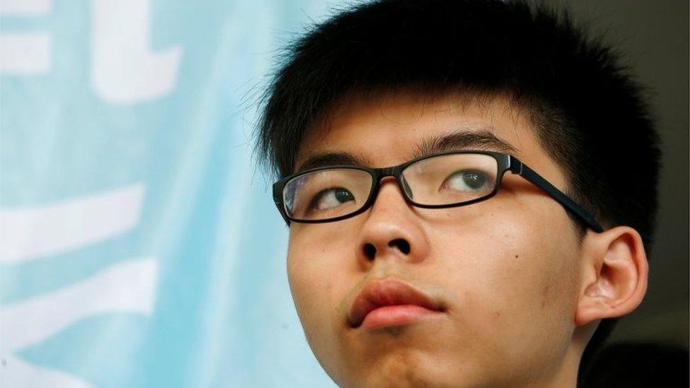 Student leader Joshua Wong looks on before a verdict, on charges of inciting and participating in an illegal assembly in 2014 which led to the "Occupy Central" pro-democracy movement, outside a court in Hong Kong July 21, 2016